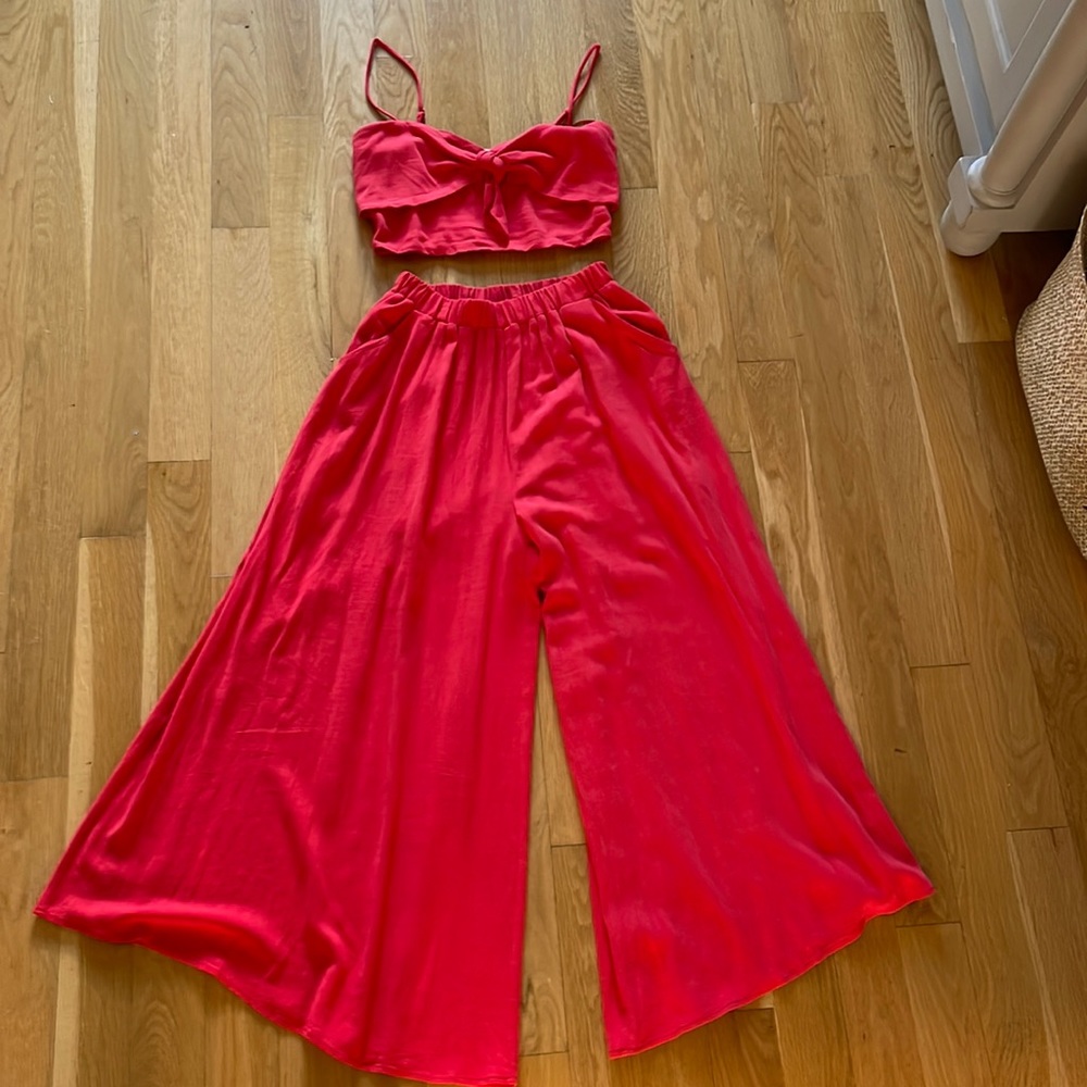 Red MULLA linen & polyester two piece outfit.